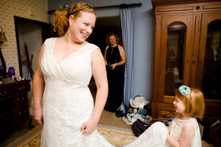 St. Louis Wedding Photography - Bride Looking at Flower Girl, Washington, MO